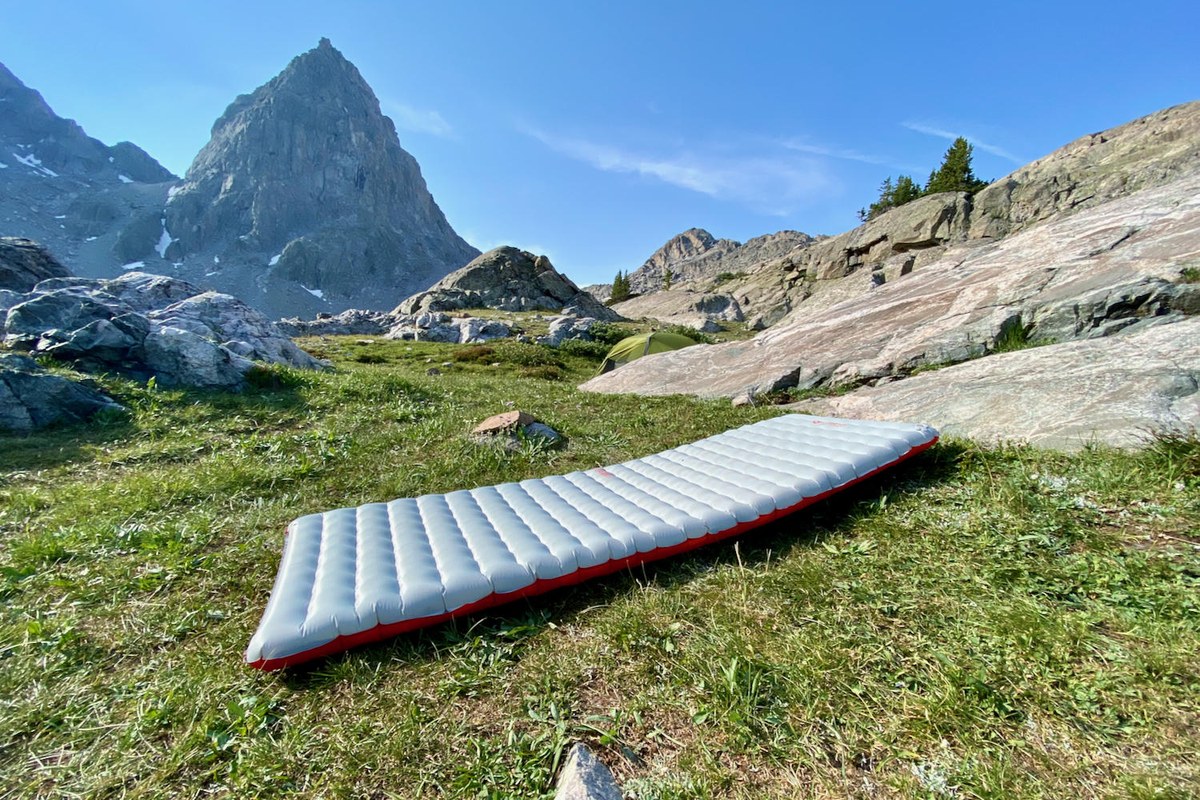 Green insulated inflatable sleeping pad, Thru Picks illustration